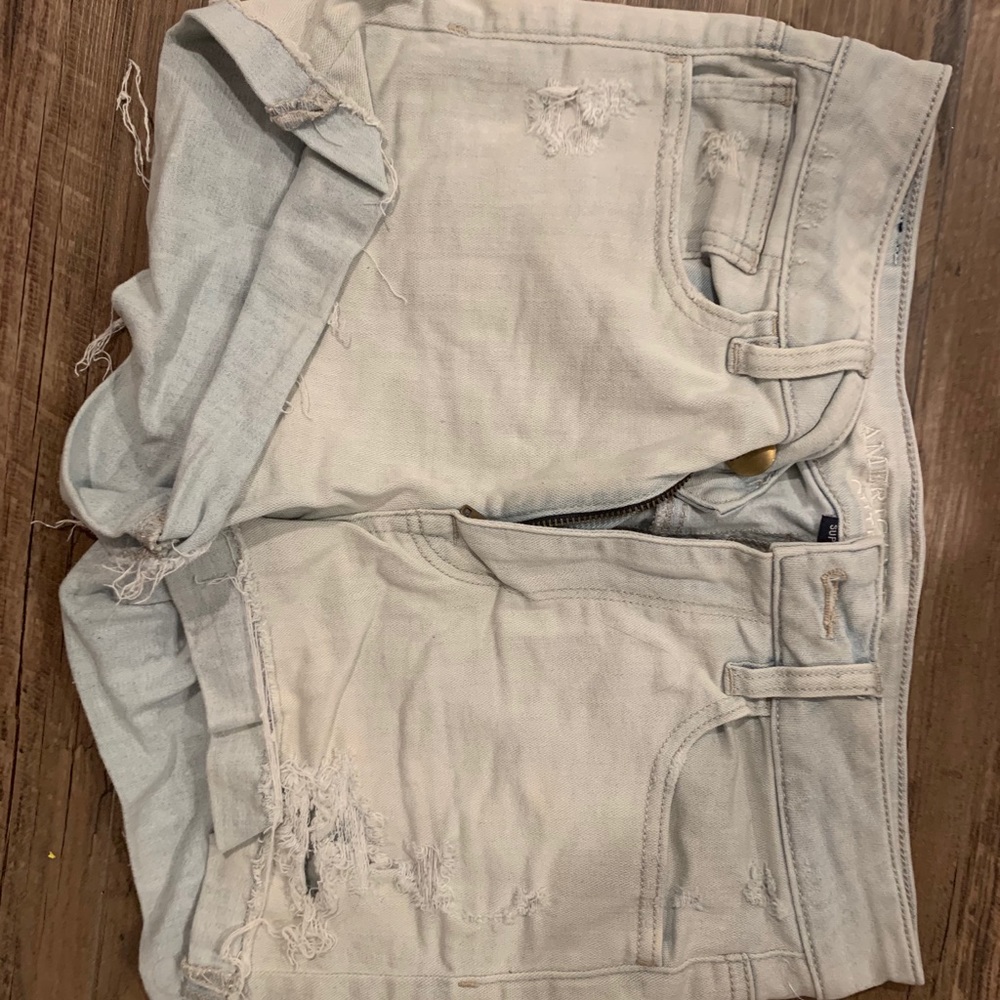 Light wash denim shorts.